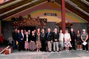 Rotarian visitors pause at the Meeting House entrance for a photo-op. 